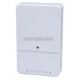 Plain white rectangular wall-mounted sensor box with a small green light in the center and vent slits along the bottom edge.