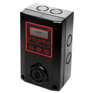 Black rectangular device with digital screen, speaker grill and LED indicators