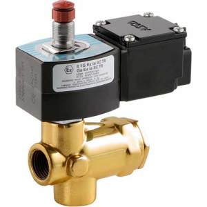Specialized solenoid valve with a brass three-way body, black enclosure and a red-capped manual override button, certified for hazardous environments.