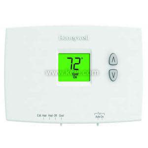 A white Honeywell thermostat with a bright green LCD screen reading 72 degrees and two vertical arrow buttons on the right side.