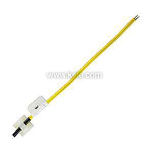 A slender yellow wire attached to a tiny white plastic sensor body with a black tip at one end.