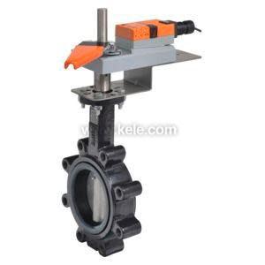Large circular black butterfly valve with multiple mounting holes, topped by a motorized actuator with orange cover and a vertical shaft.