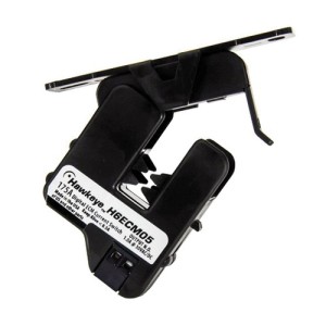 Black hinged current switch labeled H6ECM05 with rectangular opening and mounting feet.