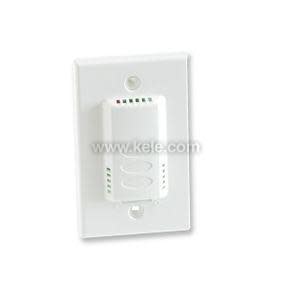 White plastic wall plate with a rectangular sensor module featuring vent slots and small colored indicators.