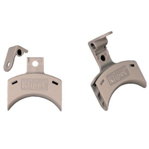 Pair of beige plastic brackets with curved shape and clip for mounting sensors