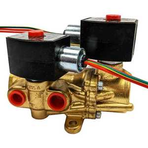 Side view of a golden brass valve with two large black solenoid coils on top, red inlet and outlet ports, and multi‑colored wires attached.
