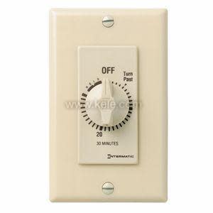 A tan wall timer featuring a rotating knob marked for up to 30 minutes with off at the top.