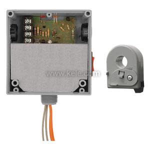 Gray relay box with circuit board and wires plus separate split-core sensor.