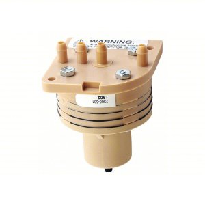 Beige cylindrical component with several small barbed fittings on top, two hex screws and O-rings around the body