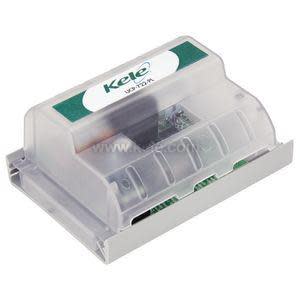 Rectangular control module with transparent hood revealing green electronics and wiring terminals