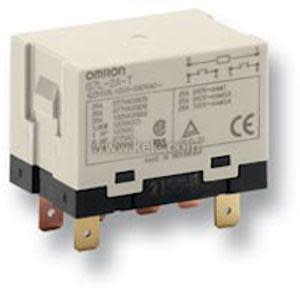 Beige rectangular relay with black base and four flat copper blades for electrical connection.