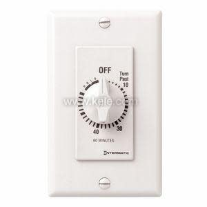 A white wall plate with a circular timer dial marked from zero to sixty minutes and an off label above.