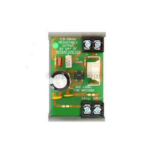 Green circuit board power module with capacitor, adjustable knob and screw terminals.