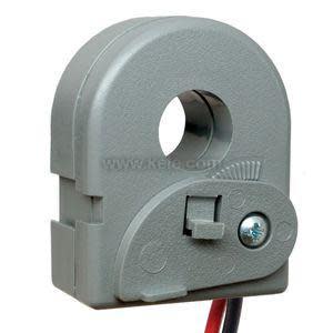 Grey plastic clamp‑on current sensor with a circular opening, hinged latch and wires exiting the bottom