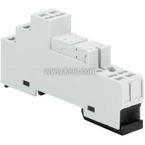Image of a multi‑tiered light grey relay base featuring numerous small terminal holes and a black mounting clip at the bottom for attaching to a DIN rail.