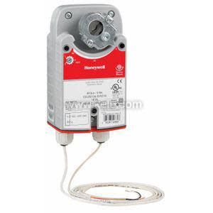 Tall rectangular actuator device in gray with a red label, featuring a circular clamp at the top and two cables extending from the bottom.