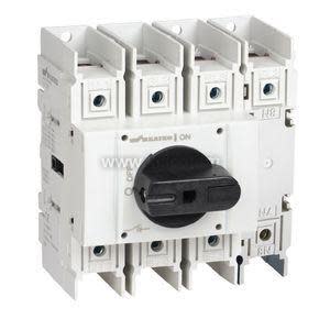 A blocky white electrical component with four terminal sections and a central black rotary knob.