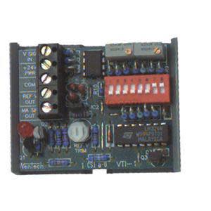 Square circuit board with a red DIP switch row on the right and a black terminal block with screw clamps on the left.