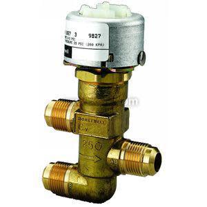 Compact motorized valve with brass body and grey actuator head