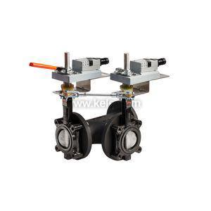 Two connected butterfly valves on a black pipe spool each controlled by a small rectangular grey electric actuator