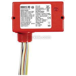 small red electronics box with a large information label and a cluster of wires