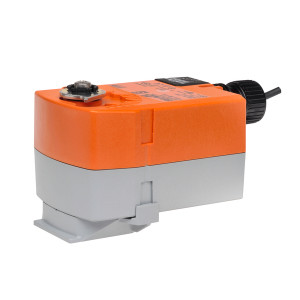 Compact orange and grey actuator with metal drive hub on top and black cable gland at rear.