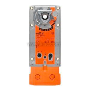 Tall rectangular device in orange and grey with a circular dial indicator and wiring harness.