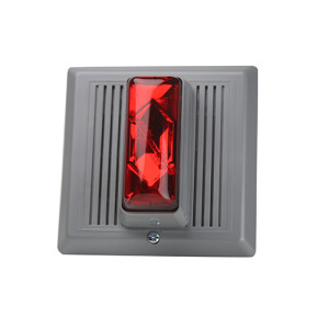 Square grey plastic plate with central red strobe light and vertical vents