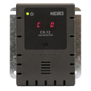 Small black gas detector with an LED display that reads C and O and a single green indicator light, housed in a slotted front case.