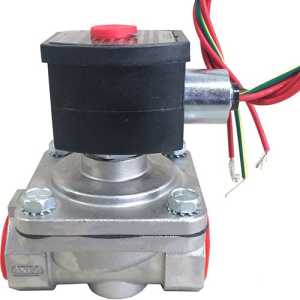 angle view of a stainless steel solenoid valve with black rectangular coil featuring a red cap; colored wires extend from the coil and the metal body has two hex bolts and red end ports