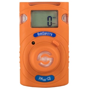 Portable orange carbon monoxide monitor labeled AimSafety PM100-CO with a small screen reading zero and circular sensor vent