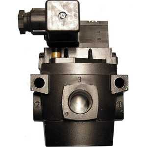 Dark rectangular valve block with a square solenoid coil on top and several round inlet and outlet openings.