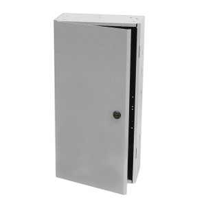 Grey recessed cabinet with hinged door partially open for housing controls.