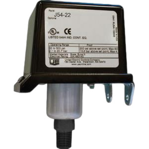 Rectangular black switch housing with white label, mounting bracket and cylindrical threaded sensor stem
