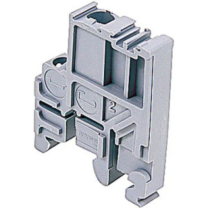 Light grey molded plastic component with slots, clip mechanisms and recesses for mounting on a DIN rail