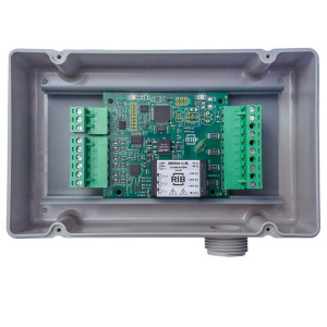 Open gray box containing a green circuit board with terminals and conduit fitting