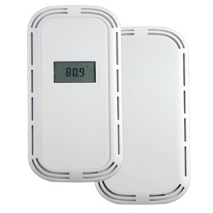 Pair of white rounded rectangular wall sensors with vent slots; one has a small digital display reading 80.9 degrees