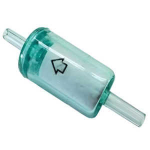 Small translucent green disposable filter with barbed ends.